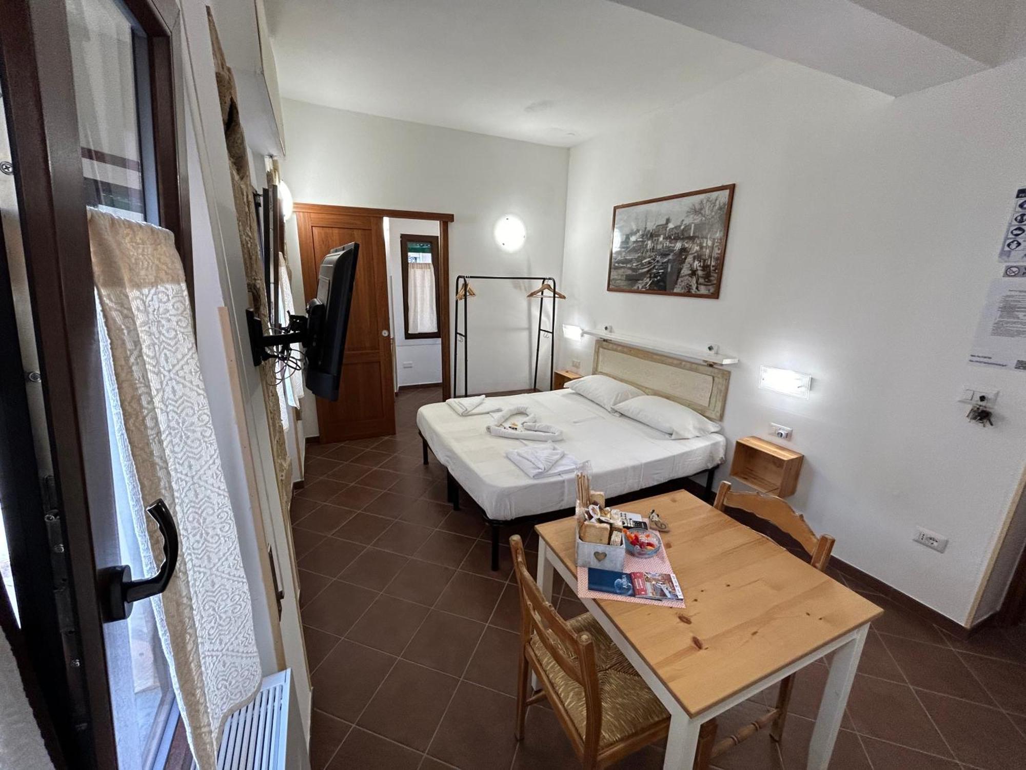 Aigua Hotel Alghero Bagian luar foto