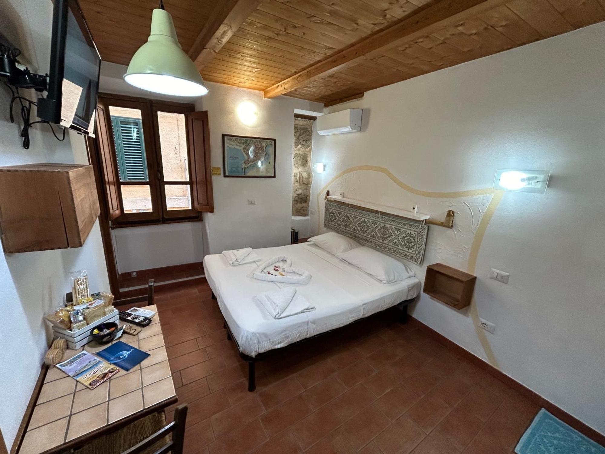 Aigua Hotel Alghero Bagian luar foto