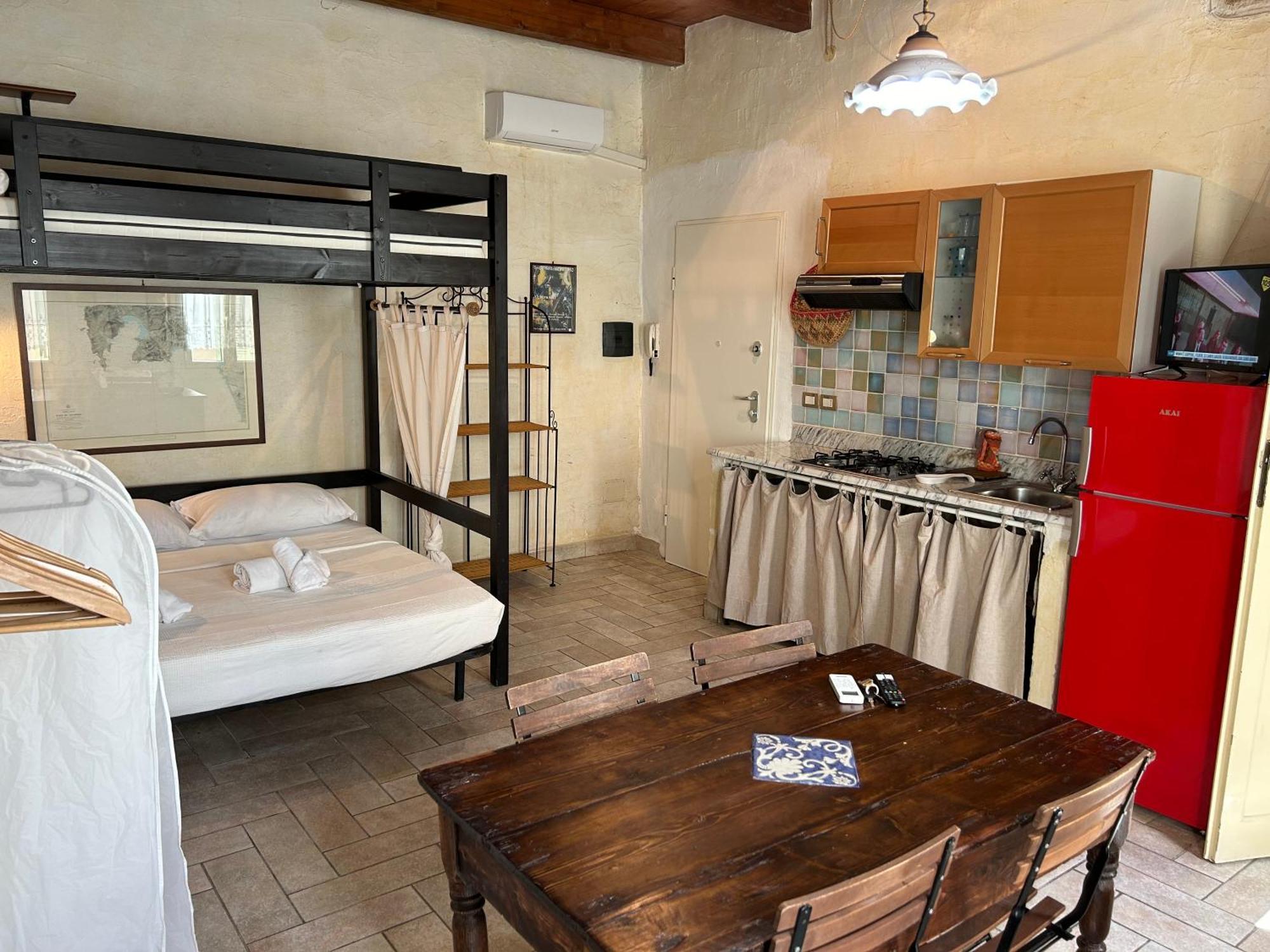 Aigua Hotel Alghero Bagian luar foto